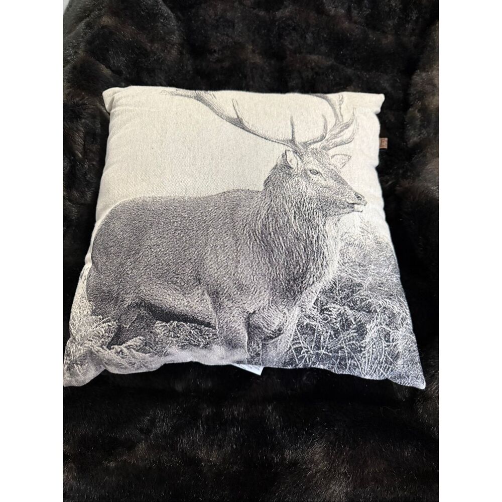 throw pillow , black-and-white print of a stag, likely a red deer or elk cabin